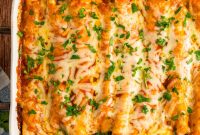 Creamy Chicken Enchiladas with Melted Cheese and Green Sauce