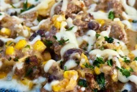 Blackstone Beef Enchiladas with Melty Cheese and Crispy Edges
