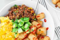 Tater Tot Breakfast Bowls with Sausage, Eggs & Cheddar