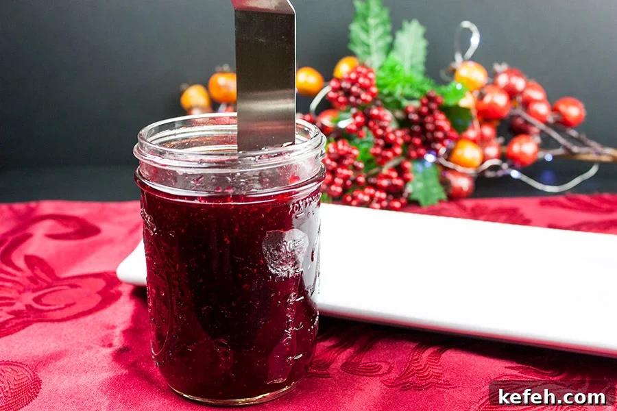 Homemade Cranberry Sauce: Jellied or Whole-Berry Recipe 4 Thin spatula running around the inside of a jar.