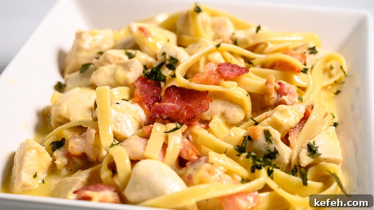 Creamy Bacon and Chicken Carbonara Recipe 8 Bacon and chicken carbonara in a bowl.