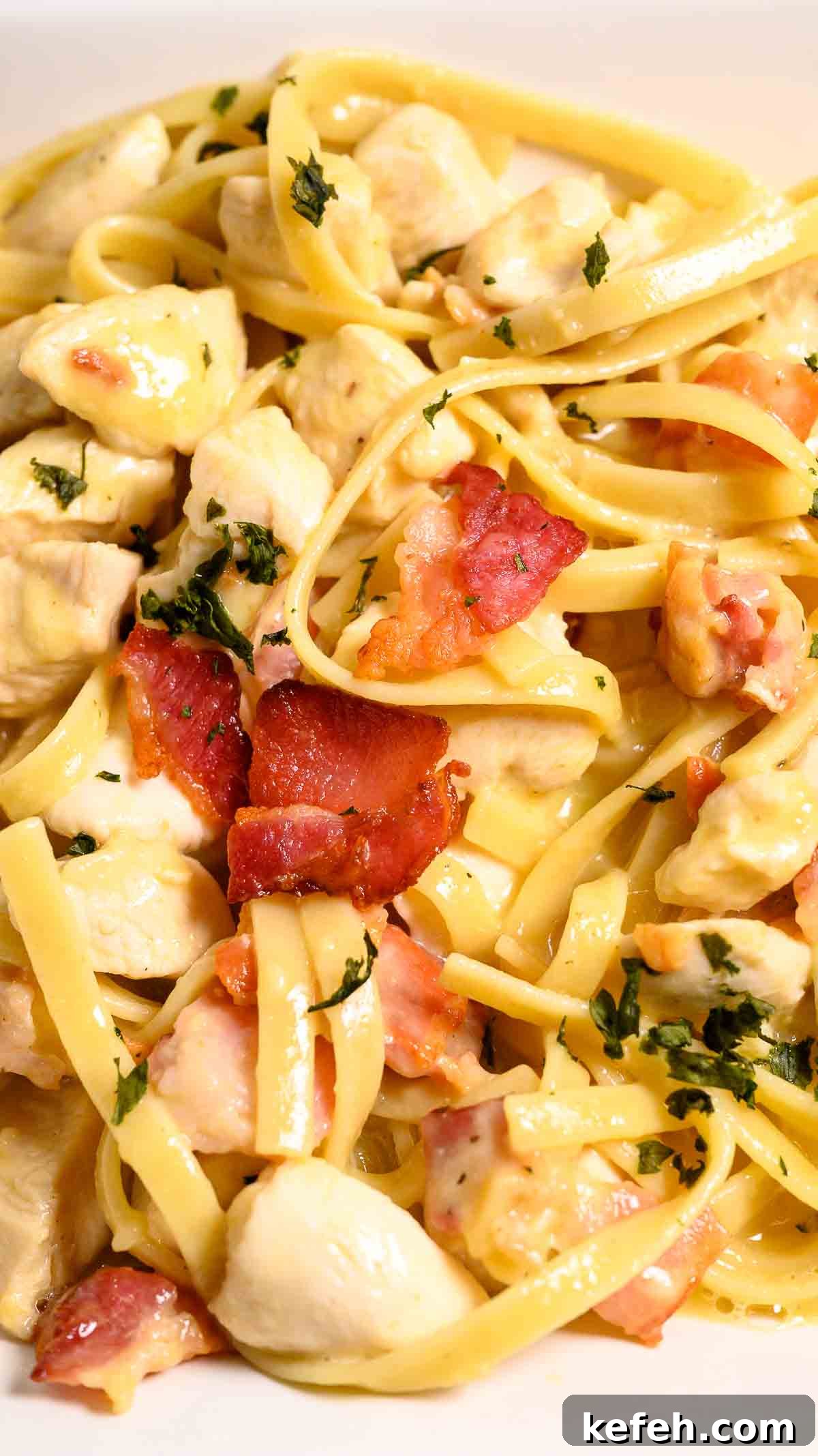 Creamy Bacon and Chicken Carbonara Recipe 9 Bacon and chicken carbonara in a bowl.