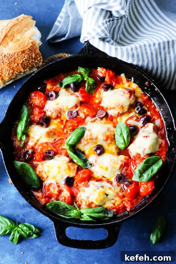 Veal Rollatini with Peppers, Cheese & Basil in Tomato-Olive Sauce 3 Veal Involtini with basil cheese and peppers in tomato olive sauce in a skillet
