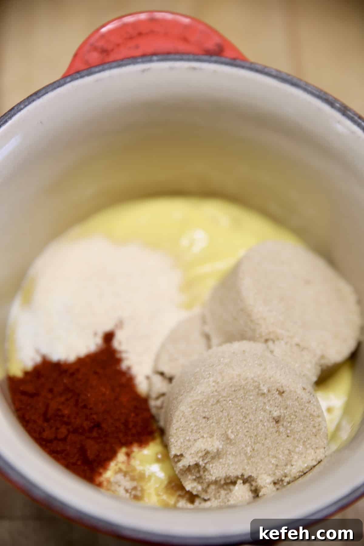 Pan with mustard, brown sugar, spices.
