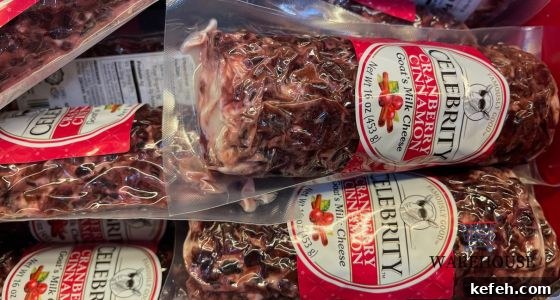 Top Costco Thanksgiving Appetizers for 2025 Holiday Entertaining 7 Celebrity Cranberry Goat Cheese log from Costco sliced with crackers — festive Costco Thanksgiving appetizer.