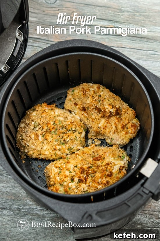 Air Fryer Italian Pork Chop Parmesan Recipe is an Easy Crusted Pork Parmesan @BestRecipeBox Air Fryer Italian Pork Chop Parmesan Recipe in a basket