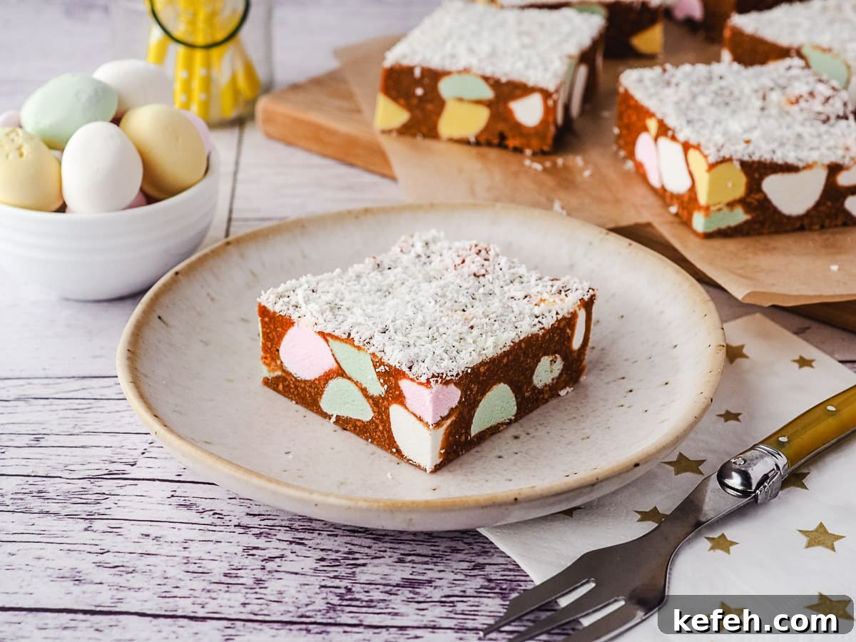 Piece of slice on a plate with a fork, with fruit puffs and rest of pieces of slice in background.