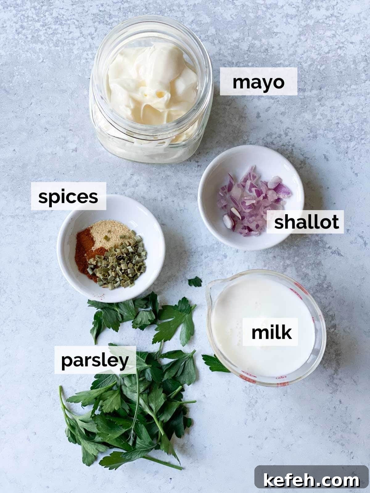 Creamy Homemade Gluten-Free Ranch Dressing Recipe 3 Spices, mayonnaise, and milk on a table.