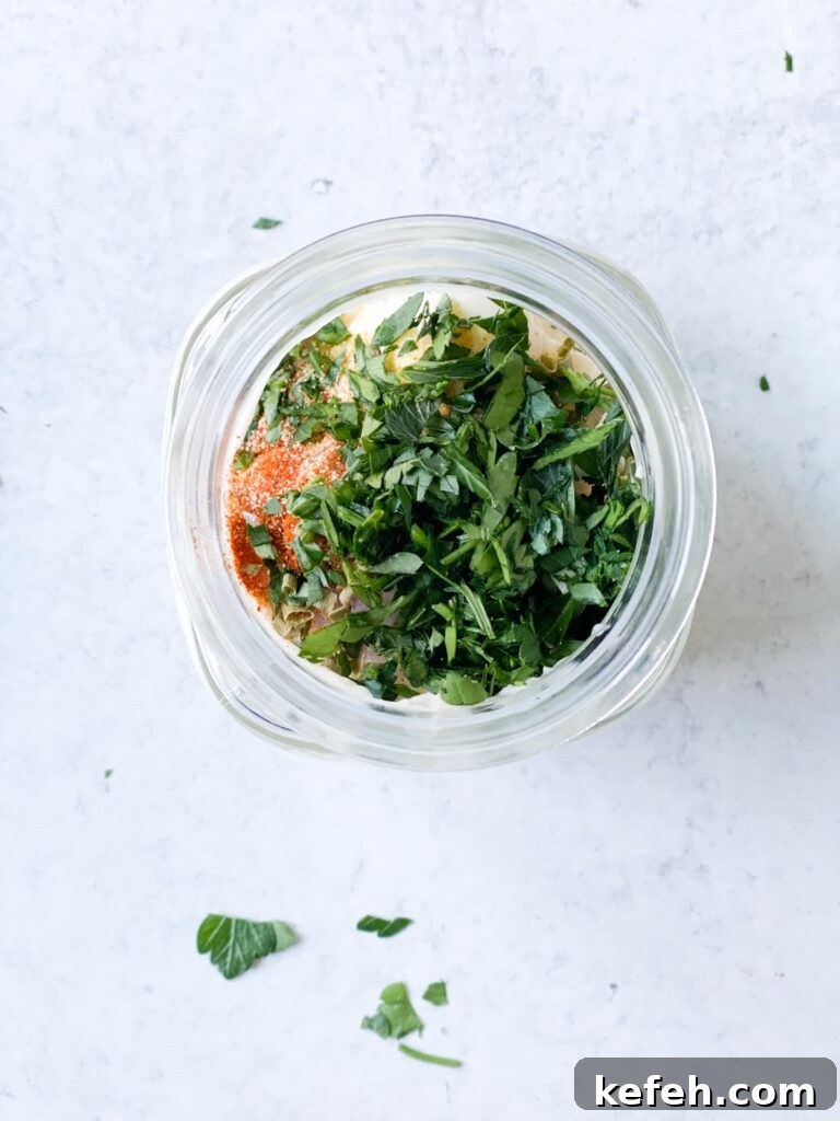 Creamy Homemade Gluten-Free Ranch Dressing Recipe 4 Fresh herbs in a mason jar.