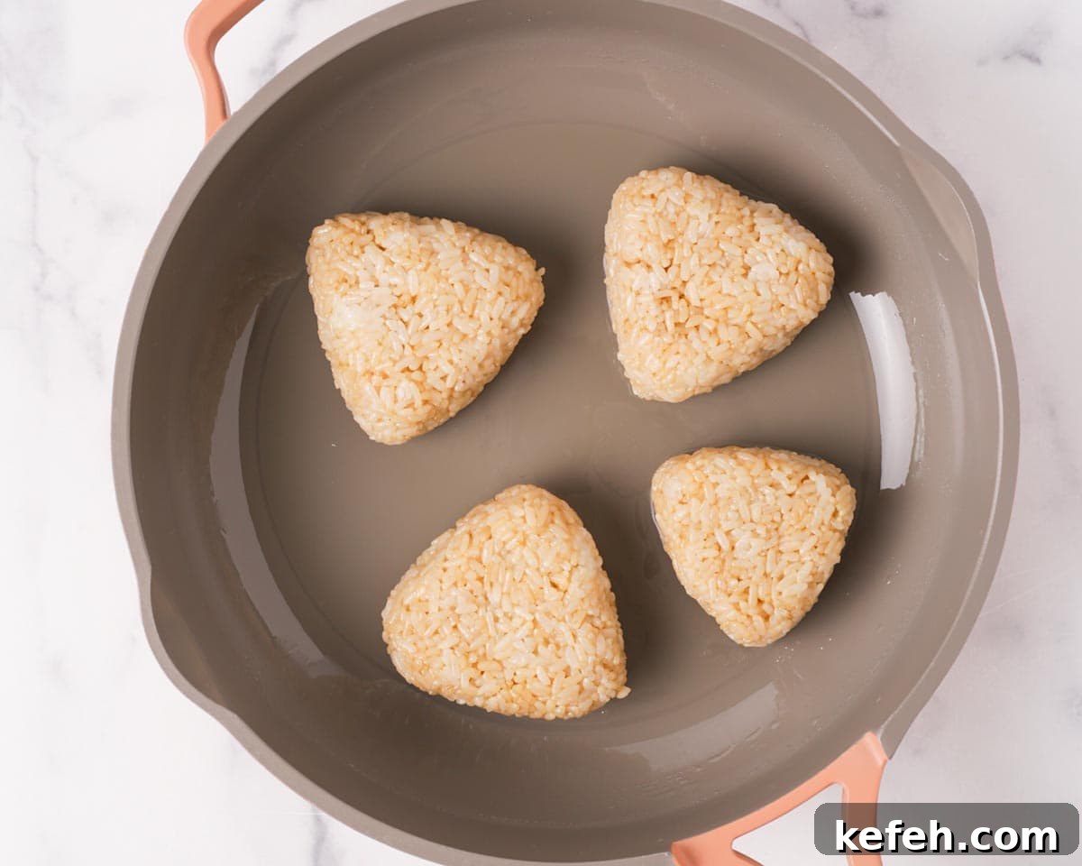 How to Make Spam Yaki Onigiri: Grilled Spam Rice Balls Recipe 7 Pan searing onigiri