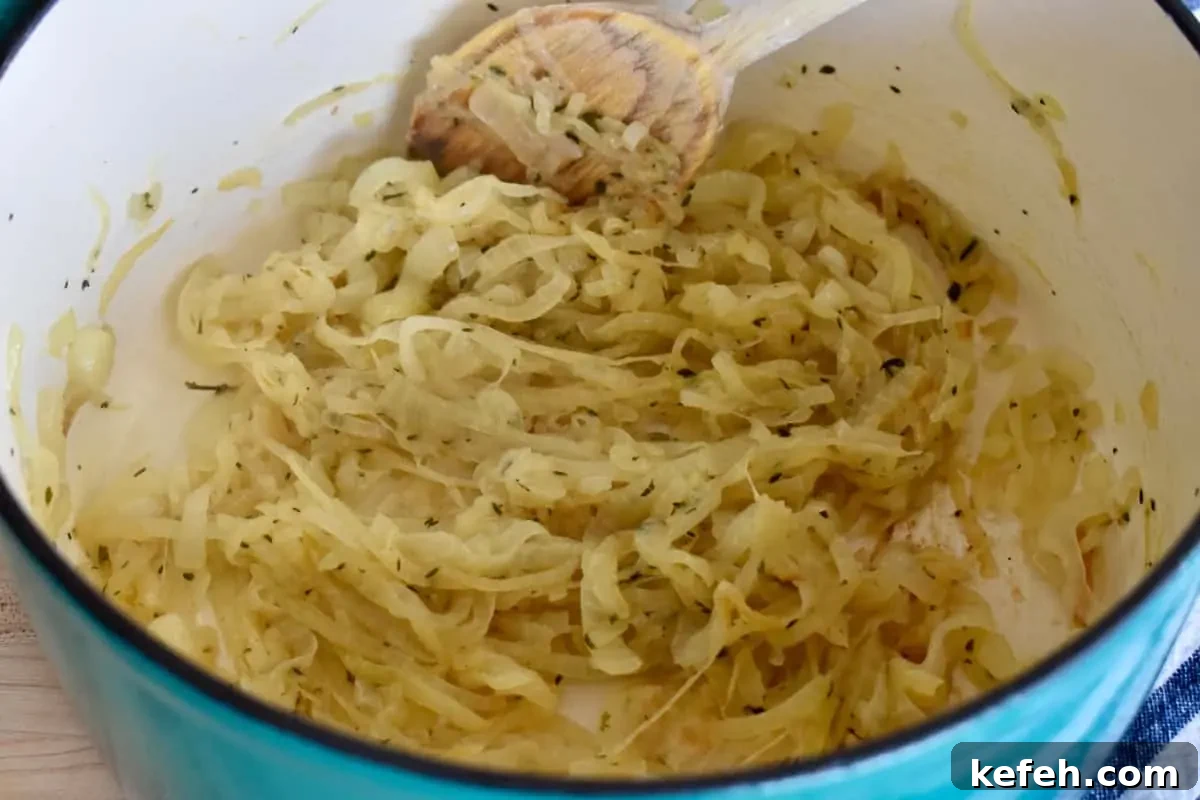 Caramelized Onion Dip Made with Greek Yogurt — Savory Party Dip 6 Caramelized Onions in a dutch oven.