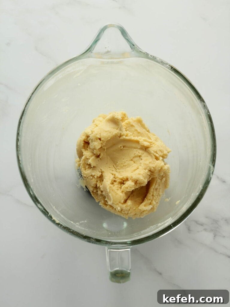 Lemon cookie dough in bowl.