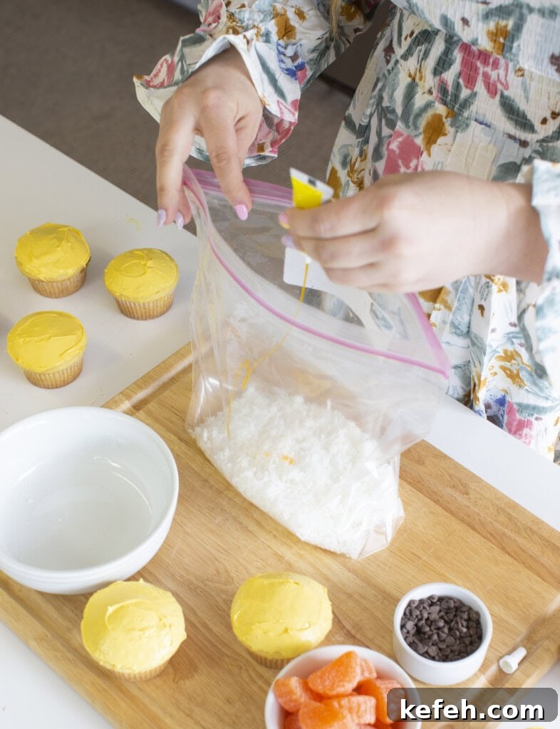 Process photo adding yellow food coloring to a bag of shredded coconut.