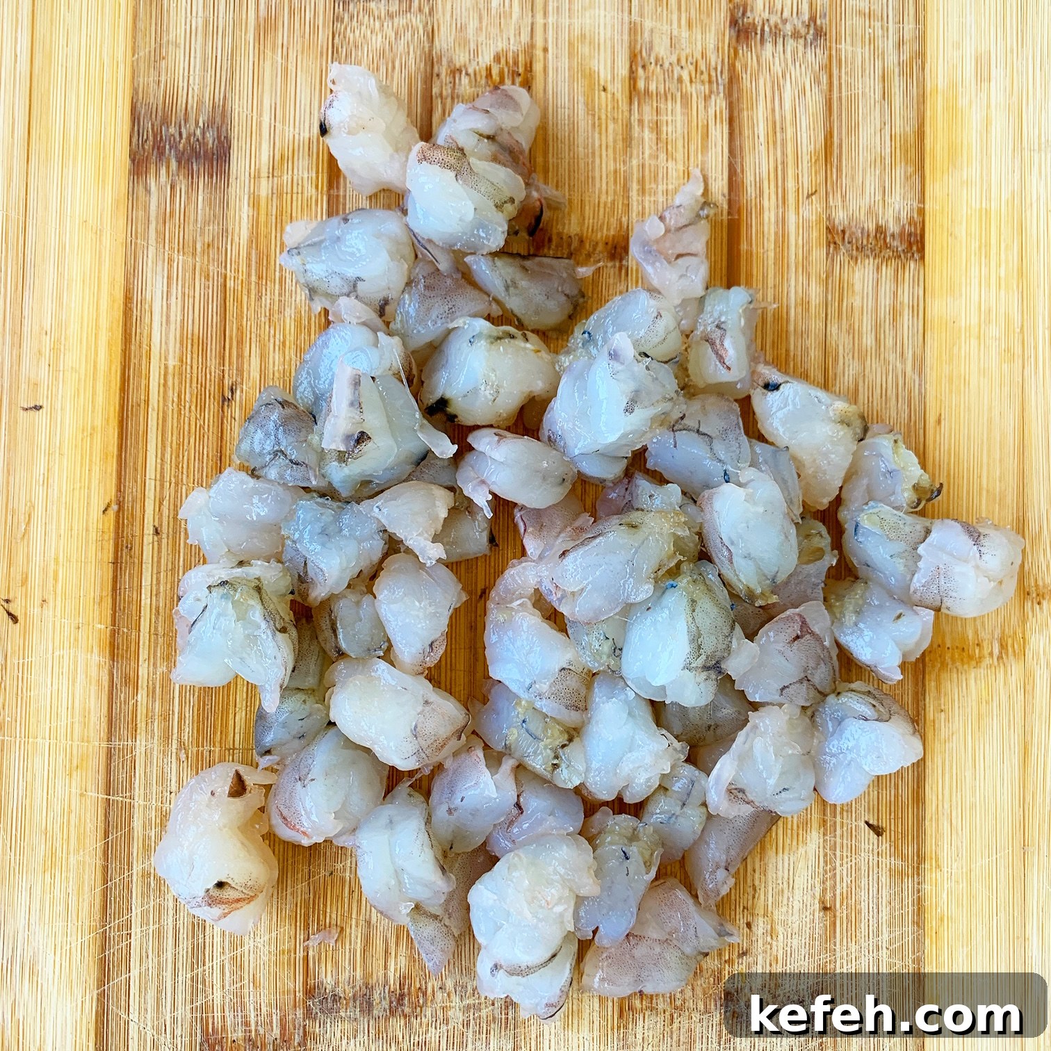 chopped shrimp on a cutting board