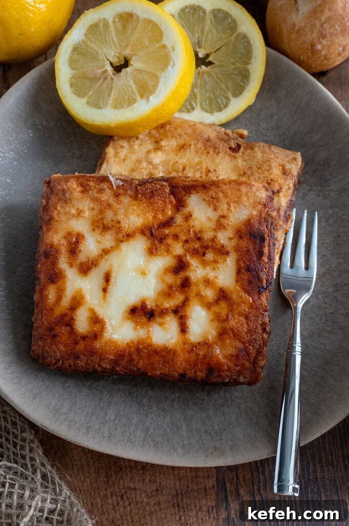 Greek Saganaki: Crispy Fried Cheese with Lemon 11 Close up of saganaki