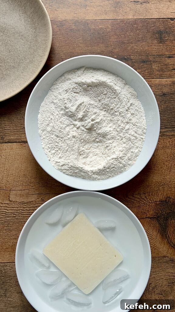 Greek Saganaki: Crispy Fried Cheese with Lemon 6 Coating cheese in flour mixture
