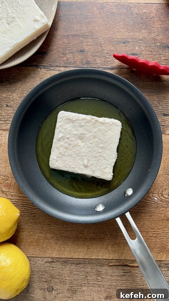 Greek Saganaki: Crispy Fried Cheese with Lemon 8 Saganaki frying in pan