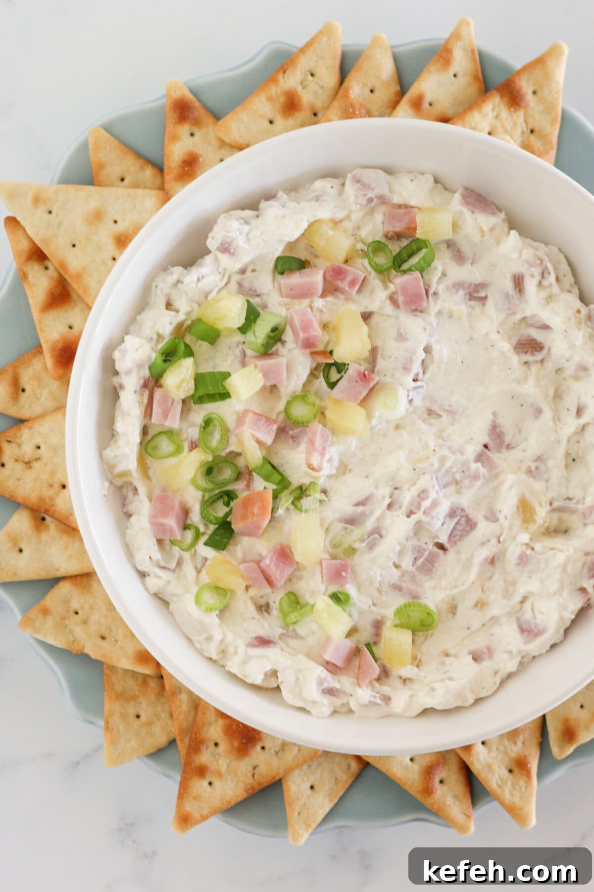 The Hawaiian dip in a bowl and ready to serve with crackers.