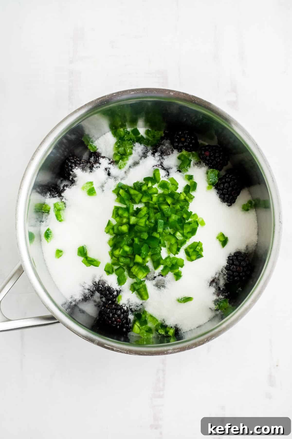 Spicy Blackberry Jalapeño Jam Recipe for Preserving and Gifts 4 Jam ingredients in a saucepan ready to cook.