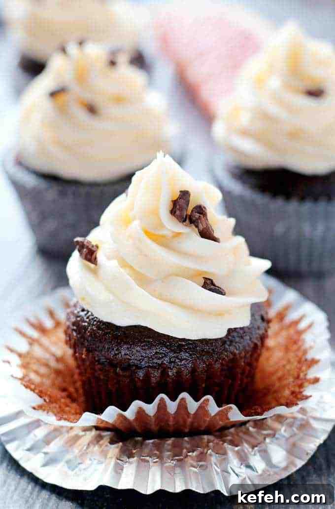 Chocolate Cupcakes with Grapefruit Curd Buttercream 2 Grapefruit curd and grapefruit buttercream frosting are delicious when enjoyed with your favorite chocolate cupcake recipe. They are the perfect way to enjoy winter citrus! | honeyandbirch.com