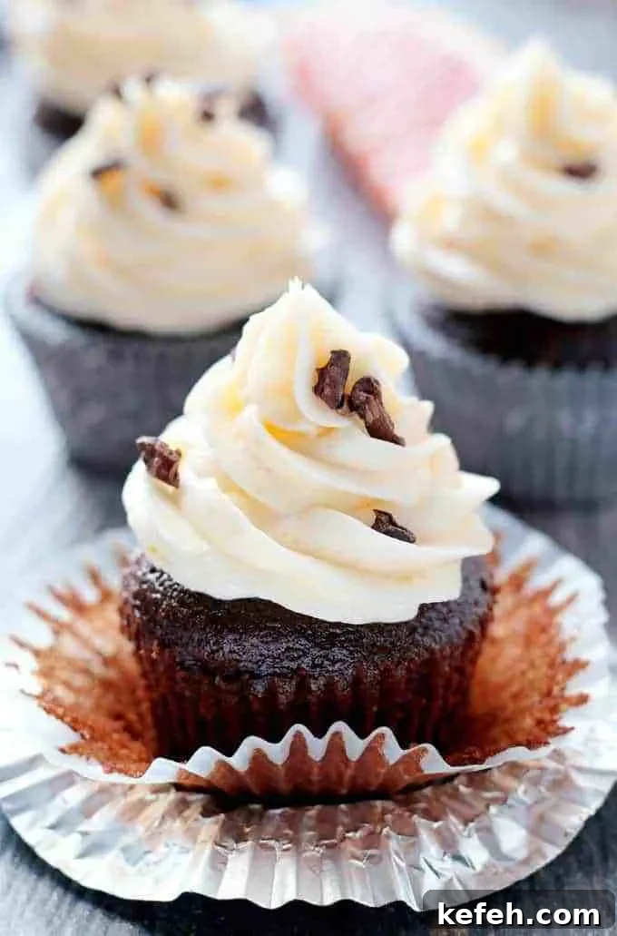 Chocolate Cupcakes with Grapefruit Curd Buttercream 6 Grapefruit curd and grapefruit buttercream frosting are delicious when enjoyed with your favorite chocolate cupcake recipe. They are the perfect way to enjoy winter citrus! | honeyandbirch.com
