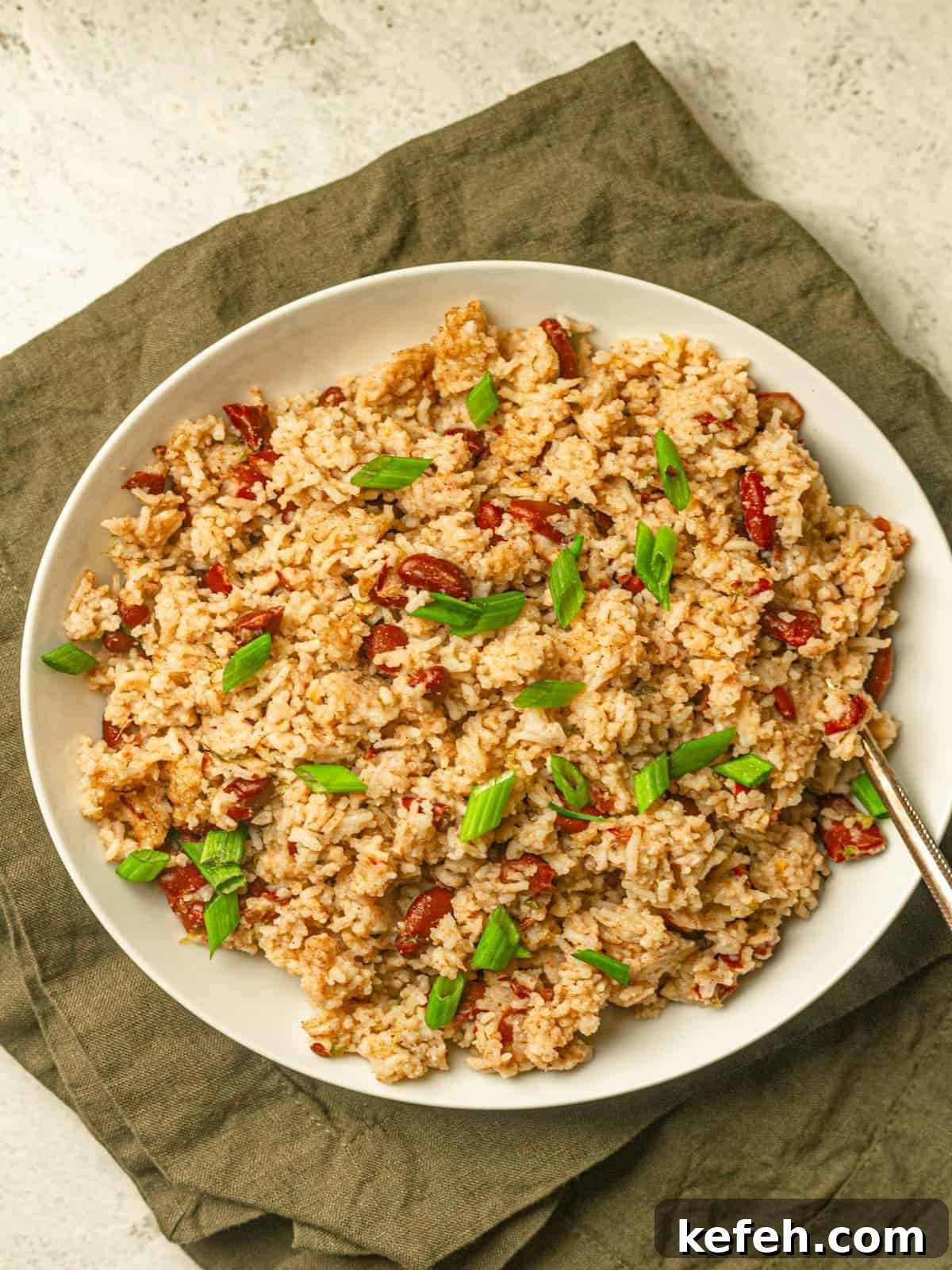 Instant Pot Jamaican Rice and Peas Recipe: Quick Authentic Flavor 4 Jamaican rice and peas on a white plate.