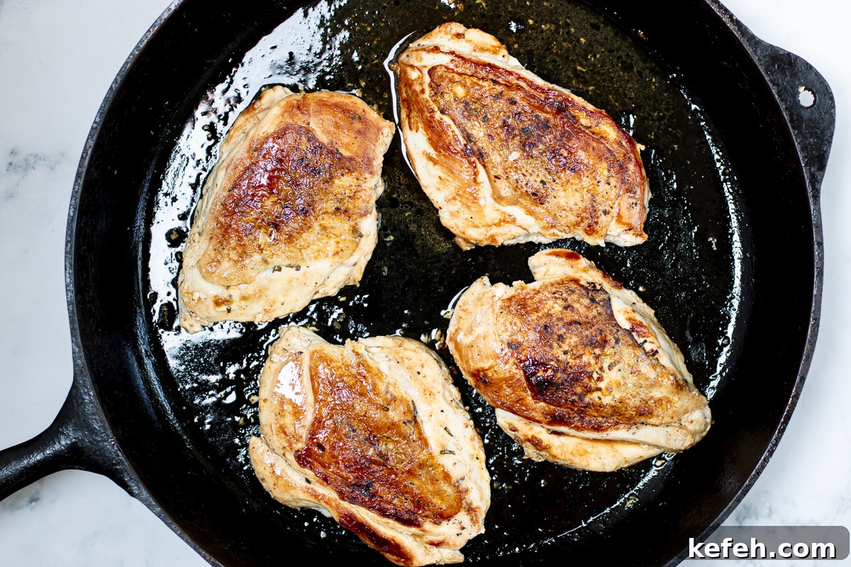 Brick-Pressed Chicken Breasts with Rustic Vegetable Ragoût 5 Turn over the chicken breasts, turn down heat and cook a few minutes until cooked through and tender