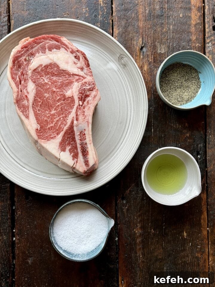 T-Bone Steak Recipe with Garlic Butter and Herbs 5 Prime rib steak with seasoning and oils, ready for cooking on a rustic wooden surface.