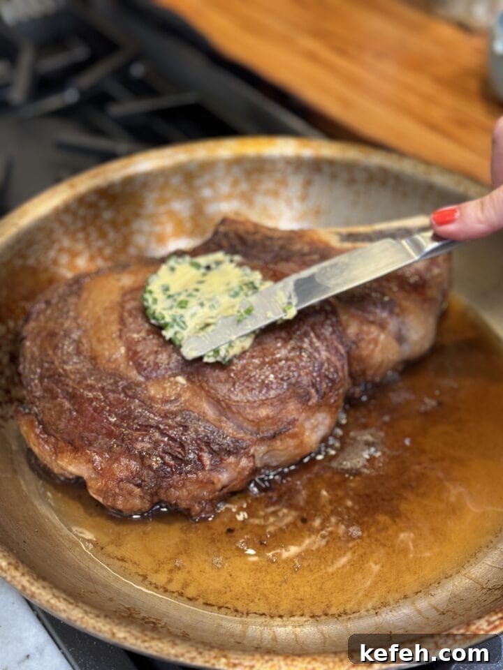 T-Bone Steak Recipe with Garlic Butter and Herbs 6 Juicy skillet-braised pork chop with herb garlic butter on top. Perfect for hearty, flavorful dinner recipes.