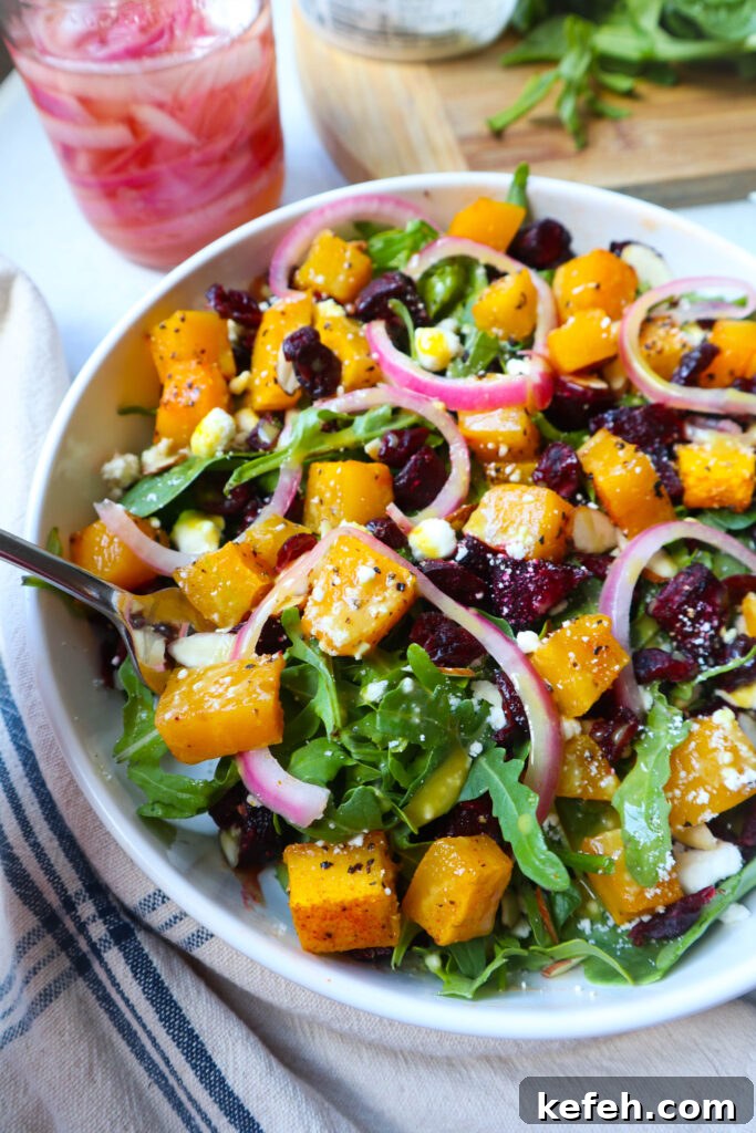 Roasted Butternut Beetroot and Feta Salad with Citrus Vinaigrette 4 Plated salad with toppings