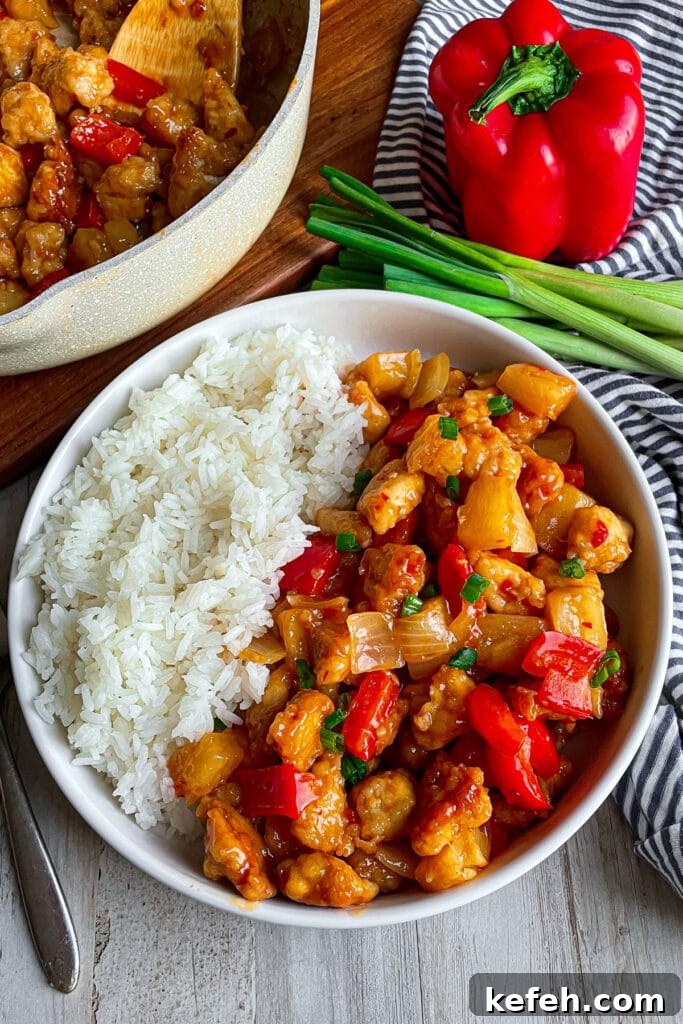 Copycat Panda Express Sweet Fire Chicken Recipe You Can Make at Home 4 easy copycat panda express sweet fire chicken served with white rice and green onions