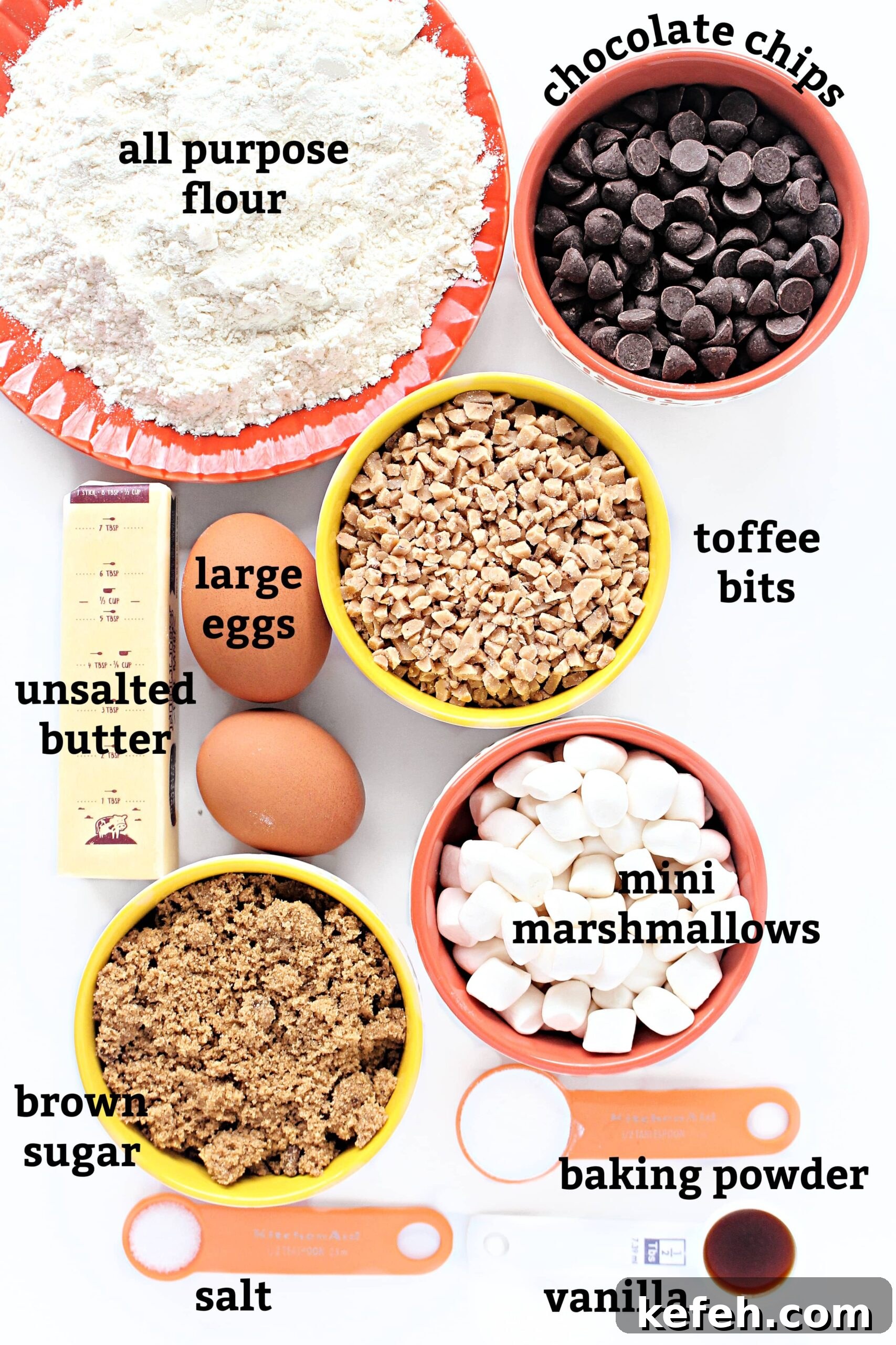 Ingredients: flour, butter, eggs, chocolate chips, toffee bits, mini marshmallows, brown sugar, salt, baking powder, vanilla.