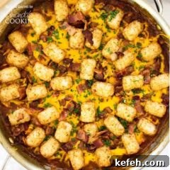 tater tot casserole garnished with bacon