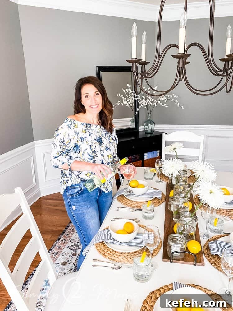 Fresh Summer Dinner Party Menu Ideas for Entertaining Guests 3 woman pouring glass of wine in dining room set for summer