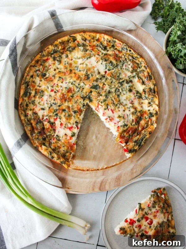 Fluffy Cottage Cheese Omelette Recipe for High-Protein Breakfast 4 An egg white quiche with a slice cut out.