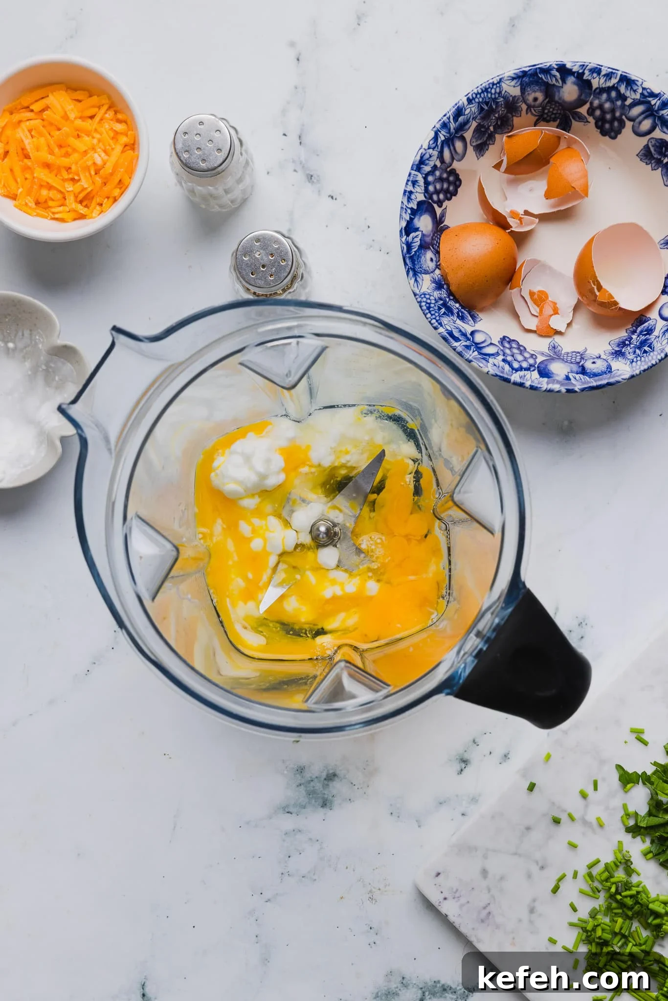This easy cottage cheese omelette is loaded with creamy, salty cottage cheese and sharp cheddar. It's a protein powerhouse! Eggs, cottage cheese, and salt in a blender.