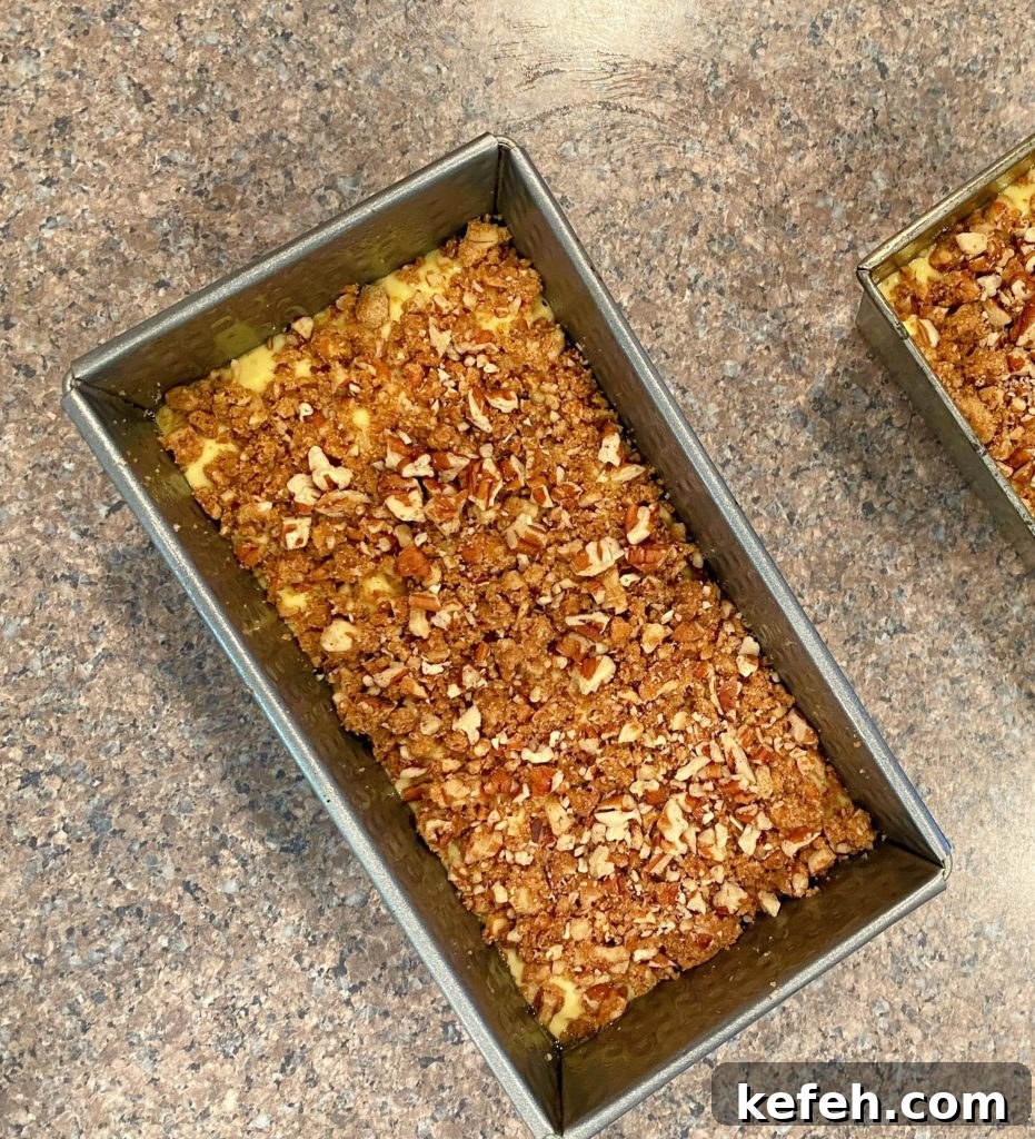 Quick Lemon Streusel Bread from Cake Mix 6 Loaf of bread sprinkled with streusel mixture.