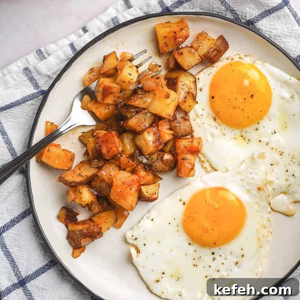 Cheater Home Fries on Plate with Eggs