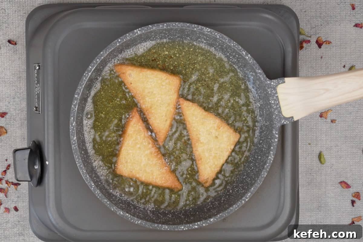 Bread slices frying in ghee.