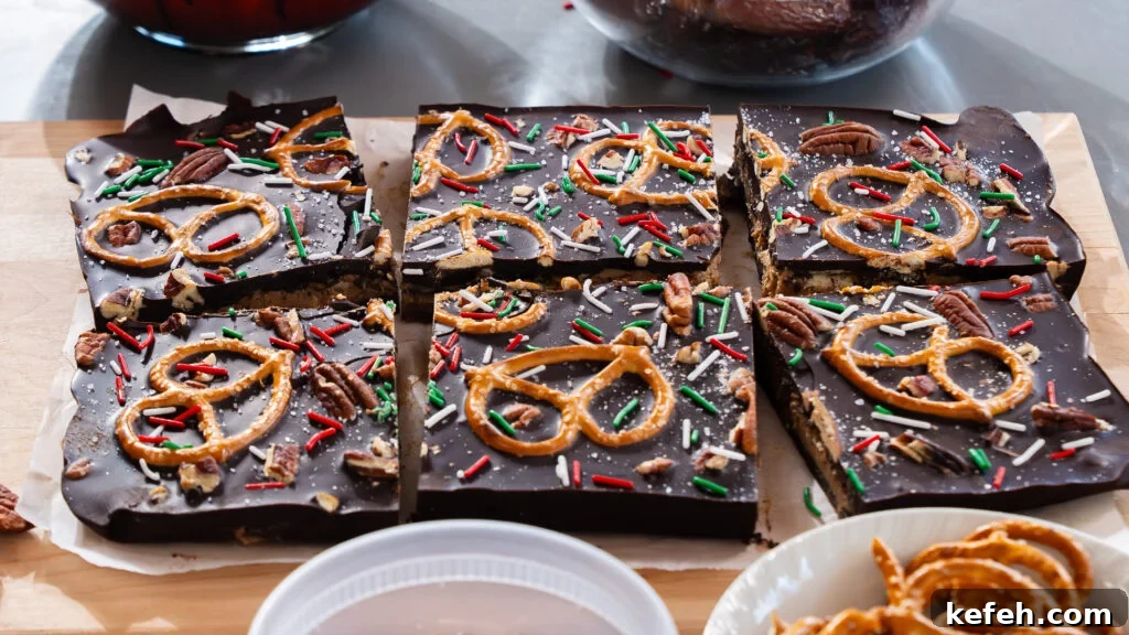 Chocolate Bark with Dates, Pecans and Pretzels: Sweet & Salty Snack 3 A delicious chocolate date bark recipe, broken into 6 large pieces.