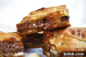 Halloween Candy Blondies Recipe with Leftover Treats (Video) 2 Leftover Halloween Candy Blondies. These are ooey gooey blondies packed full of different candies and confectionary. Perfect for leftover Halloween candy or just a chocolate lovers dream! #halloweenrecipe #leeftovercandyrecipe #candybarblondies