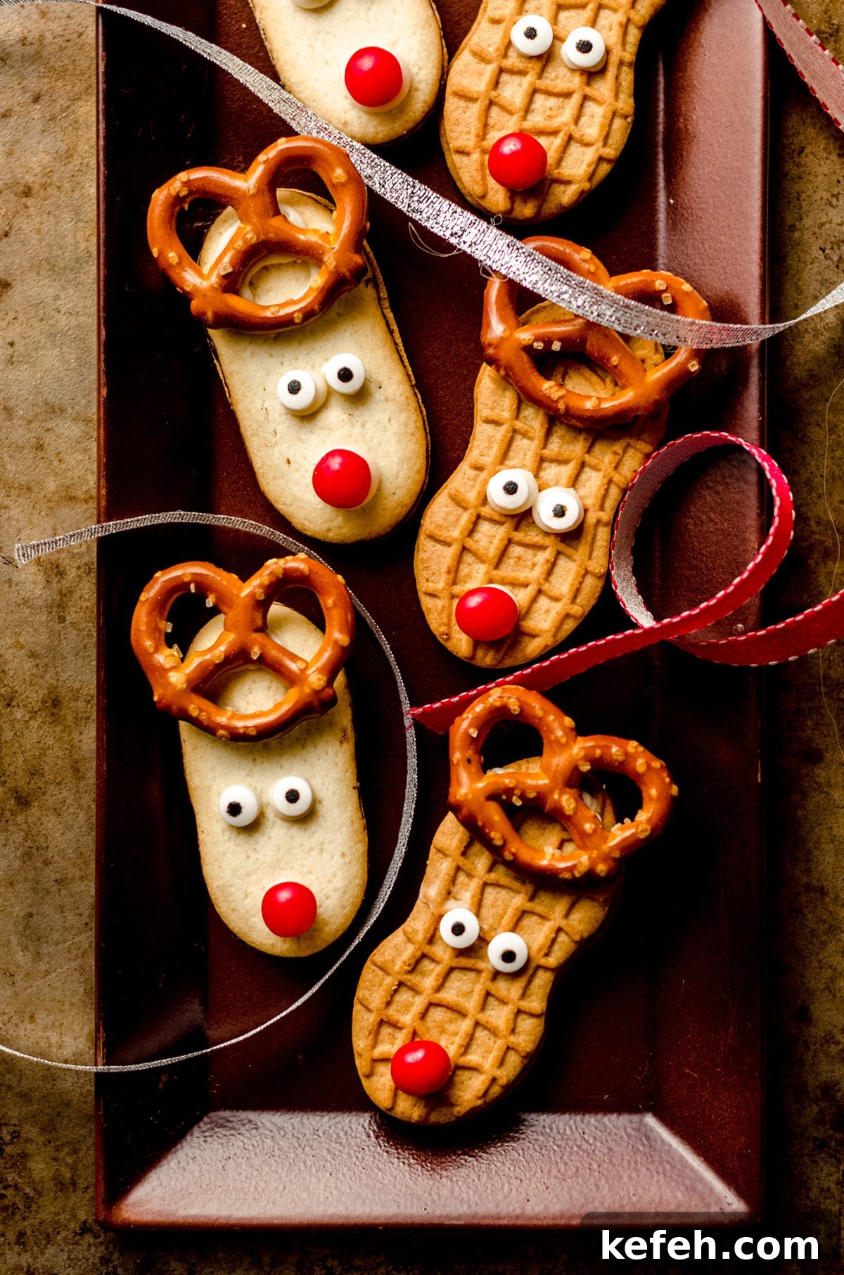 Festive Reindeer Sugar Cookies Recipe for Holiday Baking 3 reindeer cookies on a tray