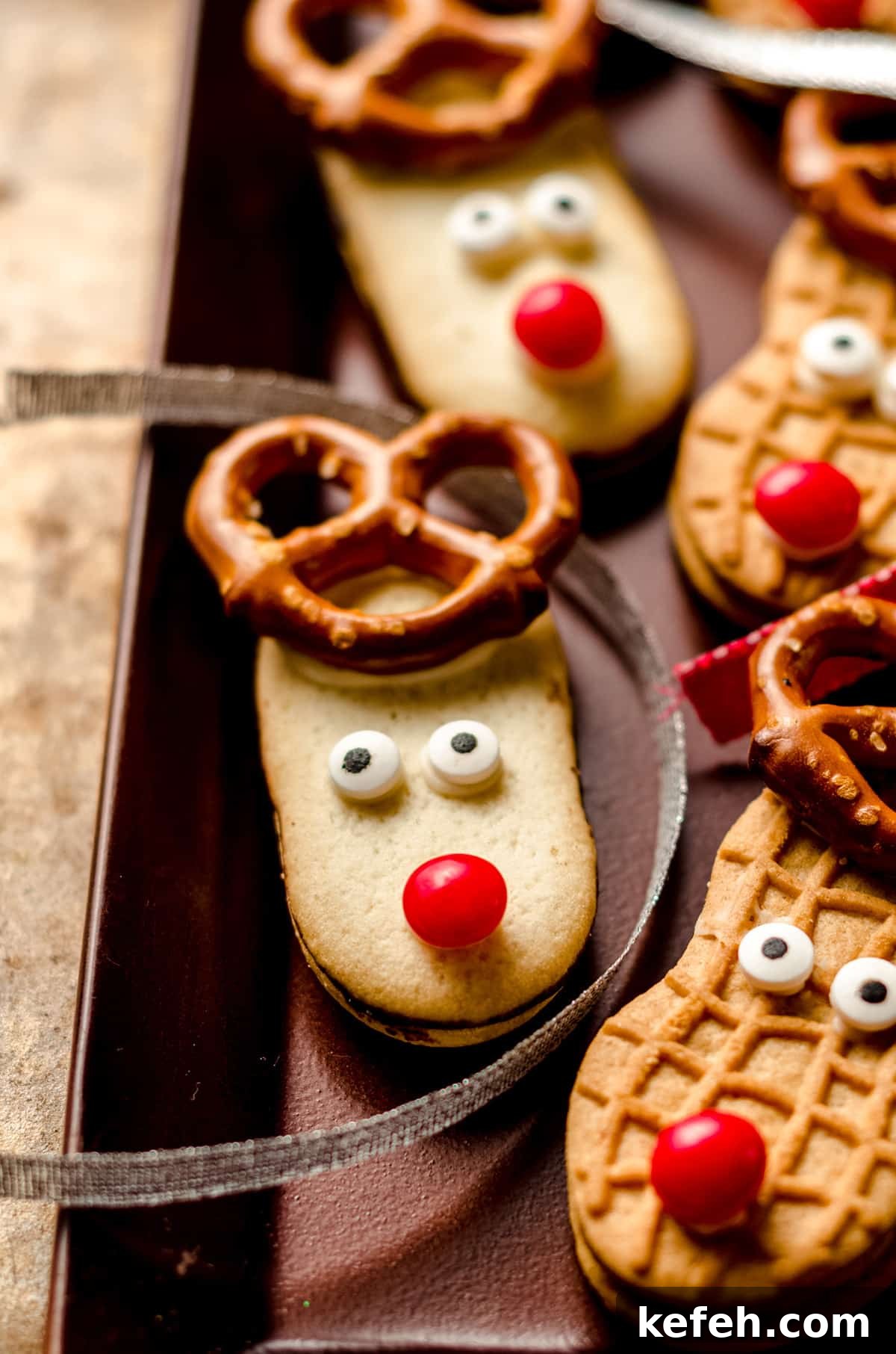 Festive Reindeer Sugar Cookies Recipe for Holiday Baking 5 reindeer cookies on a tray