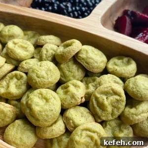 Spinach and Apple Baby Puffs — Homemade Toddler Snack Recipe 12 Spinach banana puffs served with blackberries and cherries