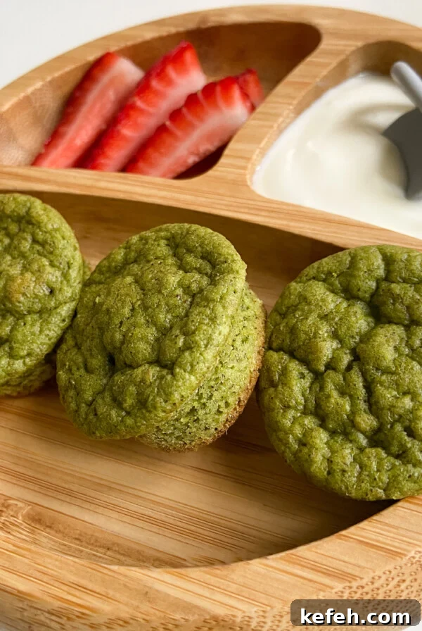 Spinach and Apple Baby Puffs — Homemade Toddler Snack Recipe 8 Spinach banana muffins served with a side of strawberries and yogurt