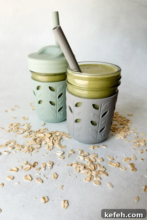 Spinach and Apple Baby Puffs — Homemade Toddler Snack Recipe 10 Spinach banana smoothies in toddler glass tumblers with silicone sleeves.