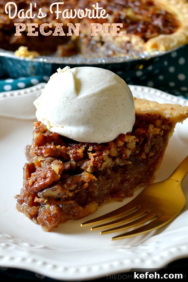 bourbon pecan pie slice with a huge dollop of whipped cream on top of a white lacy plate with a gold fork