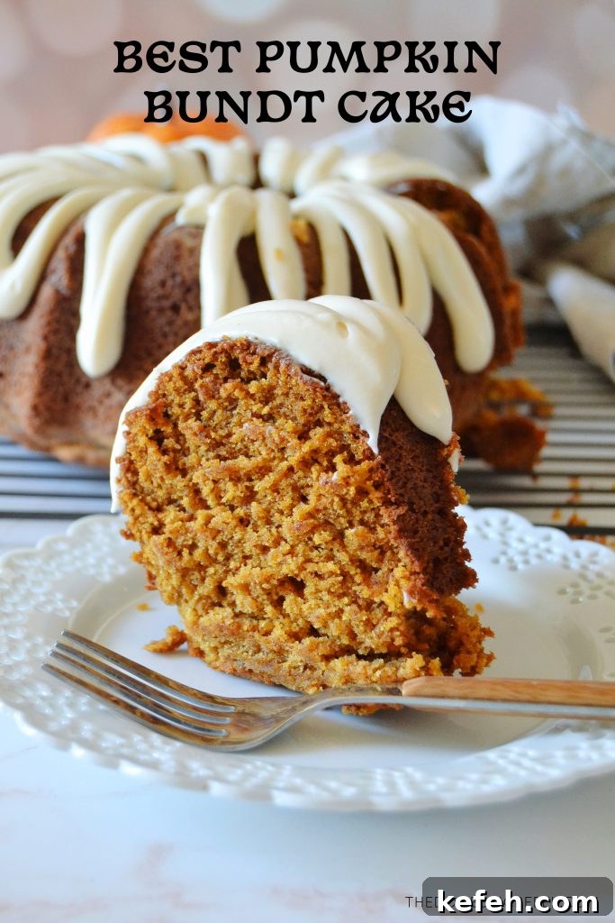 a photo of a slice of pumpkin bundt cake on a white ceramic plate with the whole cake in the background