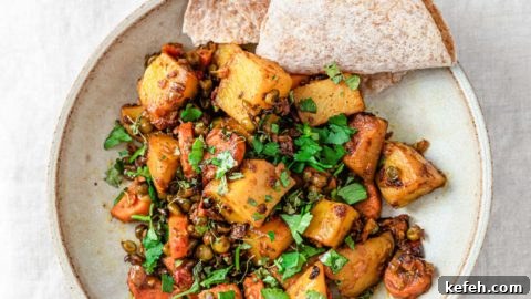 Mixed Vegetable Curry Recipe: Flavorful Indian Veggie Stew 13 Cooked mixed vegetables in a bowl