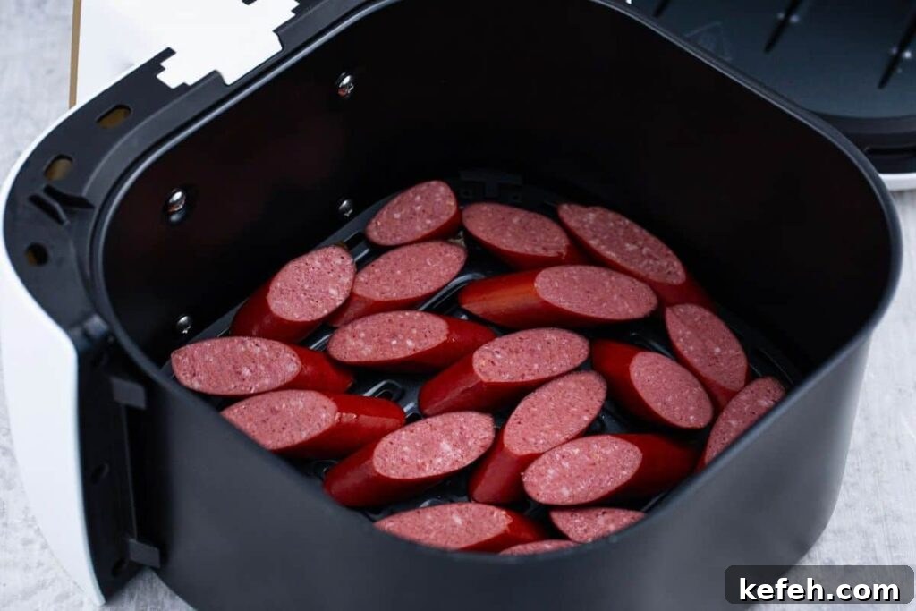 Crispy Juicy Air Fryer Kielbasa Recipe That Melts in Your Mouth 6 add kielbasa slices to air fryer basket